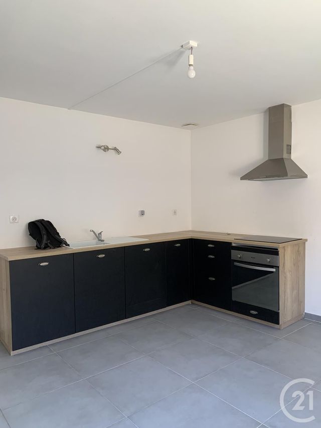 Afficher la photo en grand Appartement Duplex à louer - 3 pièces - 80.66 m2 - BEDARIEUX - 34 - LANGUEDOC-ROUSSILLON - Century 21 Agi Immobilier