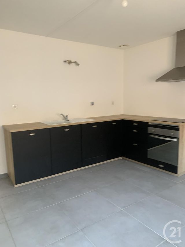 Afficher la photo en grand Appartement Duplex à louer - 3 pièces - 80.66 m2 - BEDARIEUX - 34 - LANGUEDOC-ROUSSILLON - Century 21 Agi Immobilier